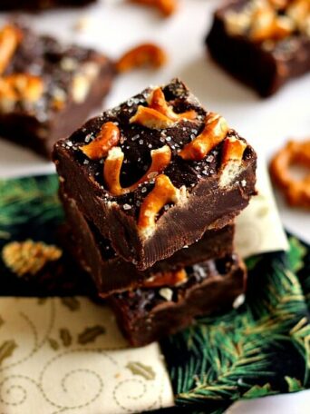 This Salted Dark Chocolate Pretzel Fudge combines smooth, rich chocolate, topped with buttery pretzels and a sprinkling of sea salt.