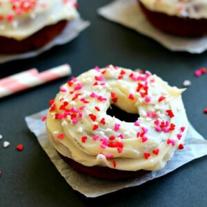 Bursting with a rich chocolate flavor and cream cheese frosting, these Baked Red Velvet Donuts are fit for the ultimate red velvet lover.