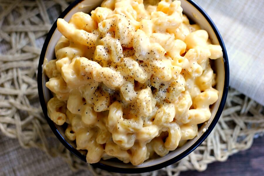 This Creamy Stovetop Macaroni and Cheese takes just minutes to prepare, contains two types of cheese, and is creamy, hearty, and delicious! #pumpkinnspice #comfortfood #sidedish #macaroniandcheese #dinner #macandcheese