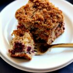 Bursting with strawberries, blueberries, blackberries, and raspberries, this Mixed Berry Coffee Cake is moist and light, with cinnamon sprinkled in.