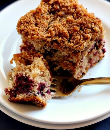 Bursting with strawberries, blueberries, blackberries, and raspberries, this Mixed Berry Coffee Cake is moist and light, with cinnamon sprinkled in.