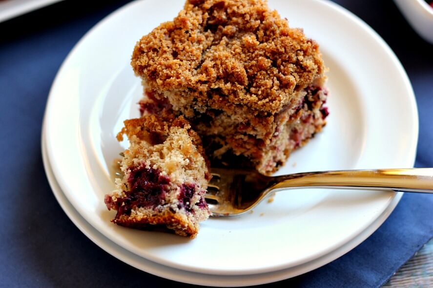 Bursting with strawberries, blueberries, blackberries, and raspberries, this Mixed Berry Coffee Cake is moist and light, with cinnamon sprinkled in.