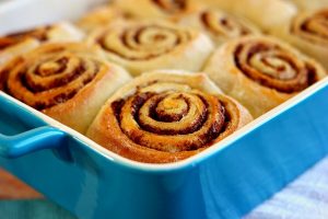 cinnamon rolls in a blue dish