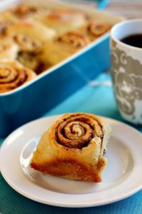 cinnamon roll on a white plate