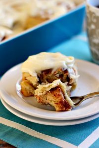 cinnamon roll with a bite on a fork