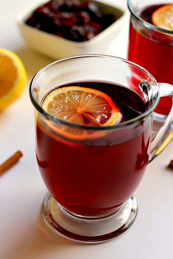 This Slow Cooker Cranberry Spice Tea is made with black tea, cranberry juice, lemon, and spices. It's perfect to warm you up when you're feeling chilled!