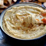Healthier than the store-bought kind and so easy to make, this Whipped Garlic Hummus will be your new favorite dip!