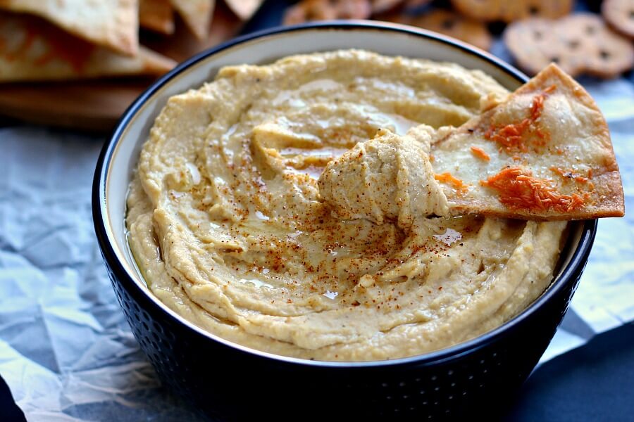 Healthier than the store-bought kind and so easy to make, this Whipped Garlic Hummus will be your new favorite dip!