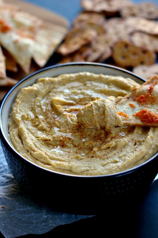 Healthier than the store-bought kind and so easy to make, this Whipped Garlic Hummus will be your new favorite dip!