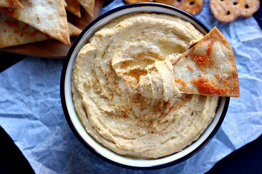 Healthier than the store-bought kind and so easy to make, this Whipped Garlic Hummus will be your new favorite dip!