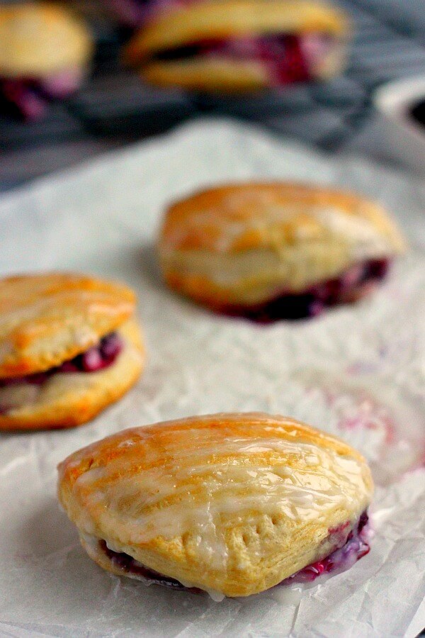 Light, fluffy, and bursting with a creamy fruit center, these Berry Cream Cheese Turnovers are perfect for breakfast, a mid-morning snack, or dessert!