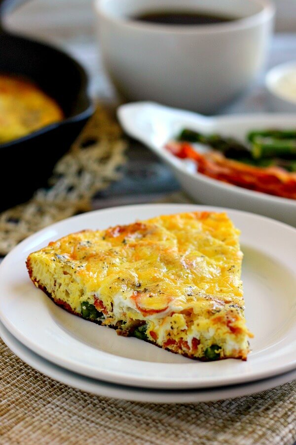 This Asparagus and Bacon Frittata is full of flavor and doubles as a quick and easy breakfast or tasty weeknight meal!