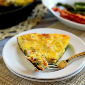 This Asparagus and Bacon Frittata is full of flavor and doubles as a quick and easy breakfast or tasty weeknight meal!
