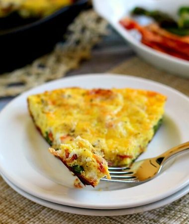 This Asparagus and Bacon Frittata is full of flavor and doubles as a quick and easy breakfast or tasty weeknight meal!