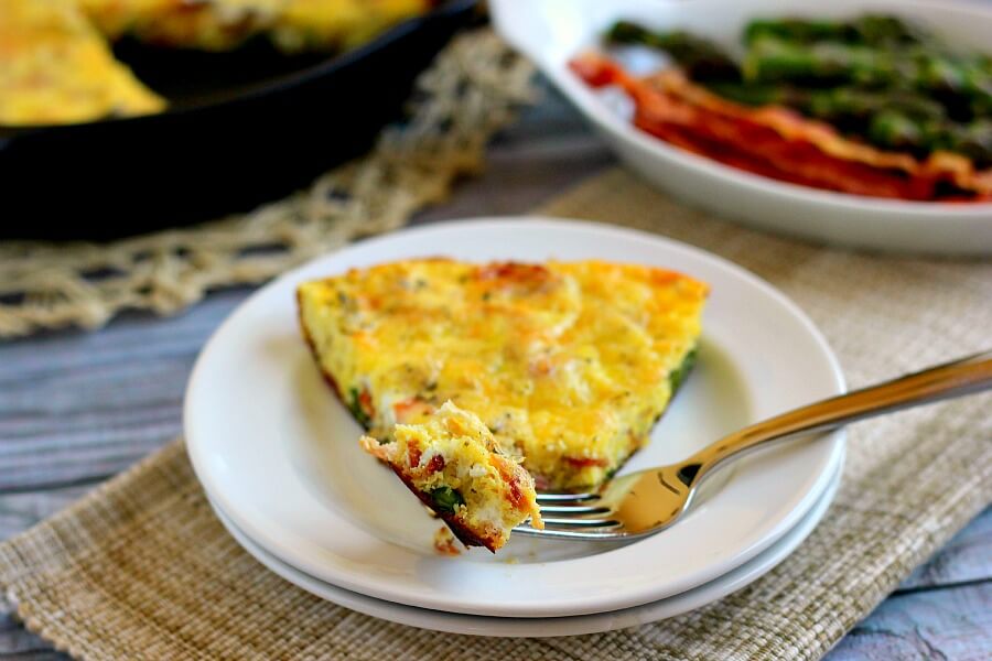 This Asparagus and Bacon Frittata is full of flavor and doubles as a quick and easy breakfast or tasty weeknight meal!