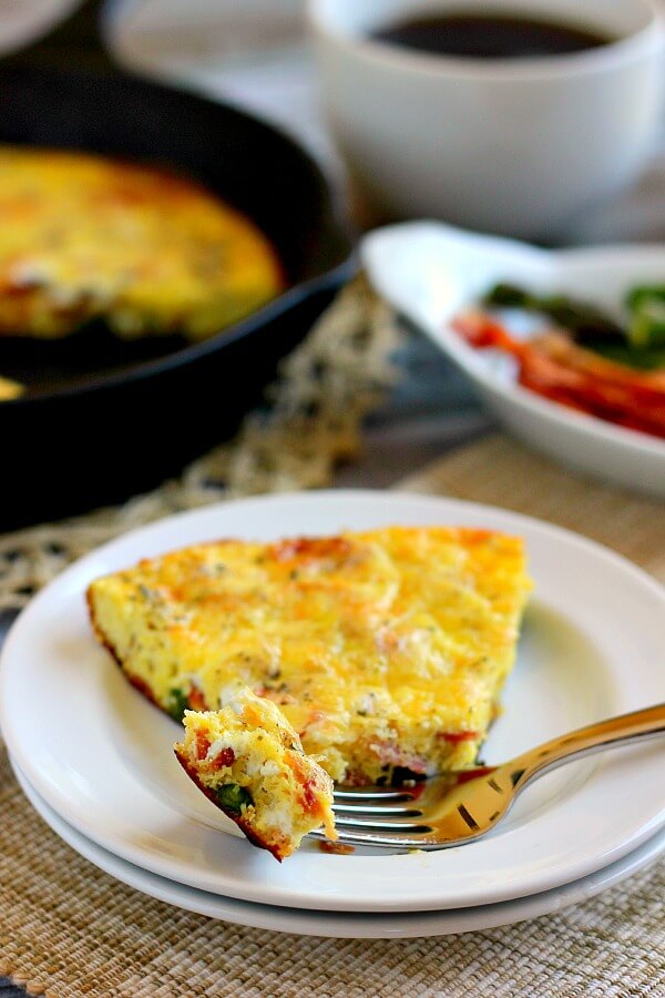 This Asparagus and Bacon Frittata is full of flavor and doubles as a quick and easy breakfast or tasty weeknight meal!