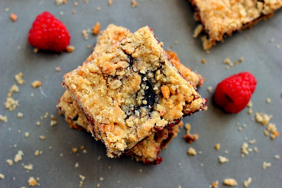 Jam-packed with raspberries, layered on a buttery crust and topped with streusel, these Raspberry Crumble Bars taste like your favorite pie, in bar form!