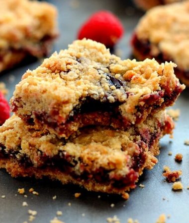 Jam-packed with raspberries, layered on a buttery crust and topped with streusel, these Raspberry Crumble Bars taste like your favorite pie, in bar form!