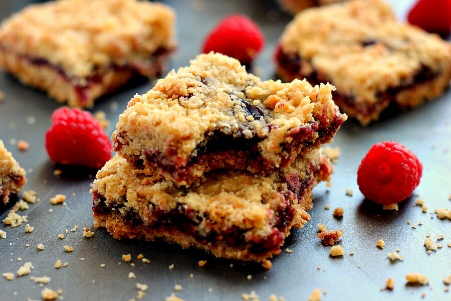 Jam-packed with raspberries, layered on a buttery crust and topped with streusel, these Raspberry Crumble Bars taste like your favorite pie, in bar form!