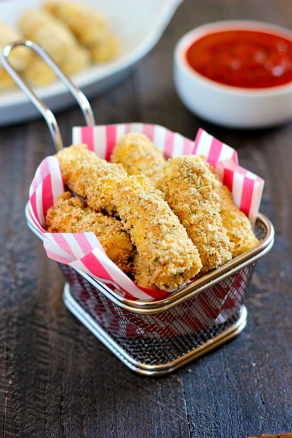 small fry basket filled with baked mozzarella sticks