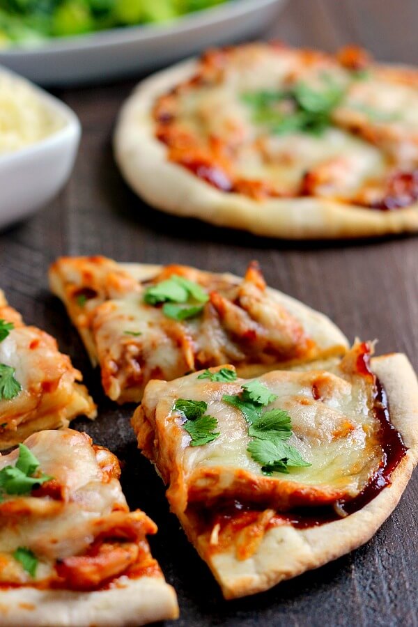 Filled with tender chicken, tangy barbecue sauce, and Mozzarella cheese, this Barbecue Chicken Pita Pizza is the perfect option for when hunger strikes!