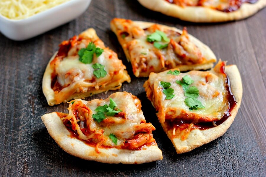 Filled with tender chicken, tangy barbecue sauce, and Mozzarella cheese, this Barbecue Chicken Pita Pizza is the perfect option for when hunger strikes!