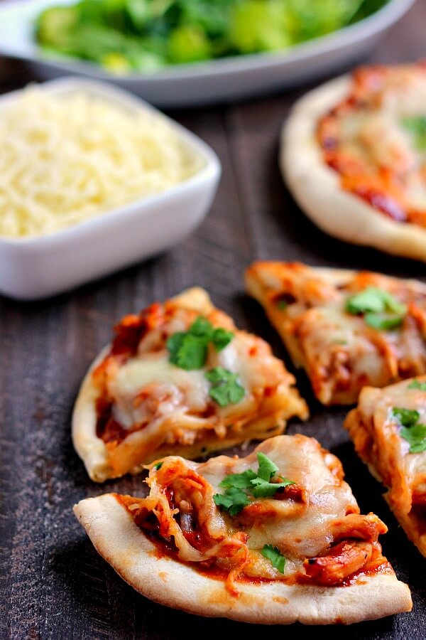 Filled with tender chicken, tangy barbecue sauce, and Mozzarella cheese, this Barbecue Chicken Pita Pizza is the perfect option for when hunger strikes!