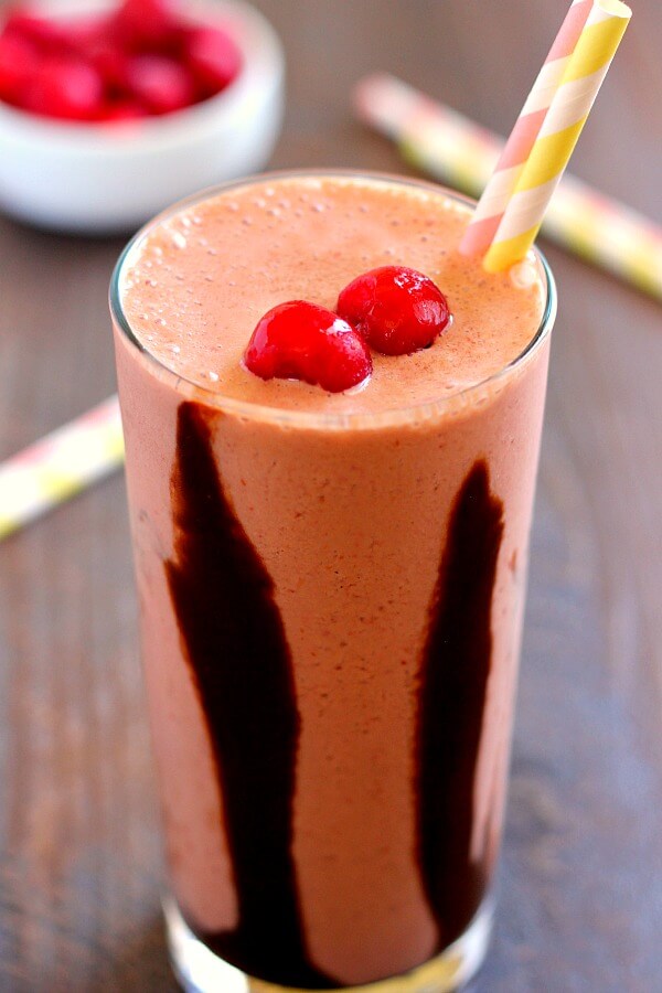 This Chocolate Covered Cherry Smoothie combines frozen cherries, creamy yogurt, and a hint of chocolate that serves as the perfect breakfast, mid-morning snack, or post workout treat!