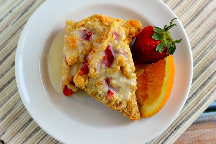 Armed with a flaky crust on the outside and full of strawberry and orange hints on the inside, these Mini Strawberry Orange Scones are the perfect treat!