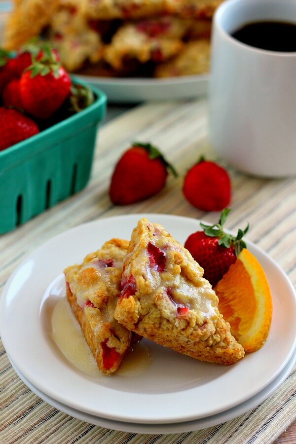 Armed with a flaky crust on the outside and full of strawberry and orange hints on the inside, these Mini Strawberry Orange Scones are the perfect treat!