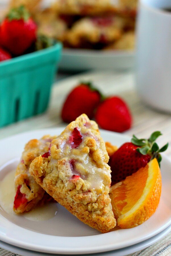 Armed with a flaky crust on the outside and full of strawberry and orange hints on the inside, these Mini Strawberry Orange Scones are the perfect treat!