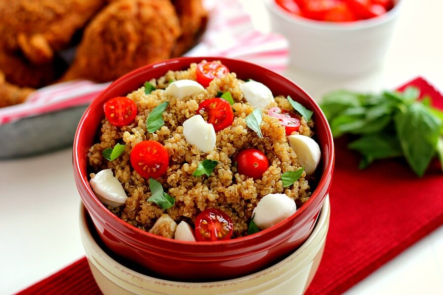 Filled with hearty quinoa, fresh tomatoes, creamy mozzarella, and basil, this Quinoa Caprese Salad combines the classic flavors into a healthier dish. It's easy to make, packed with protein, and is bursting with flavor!