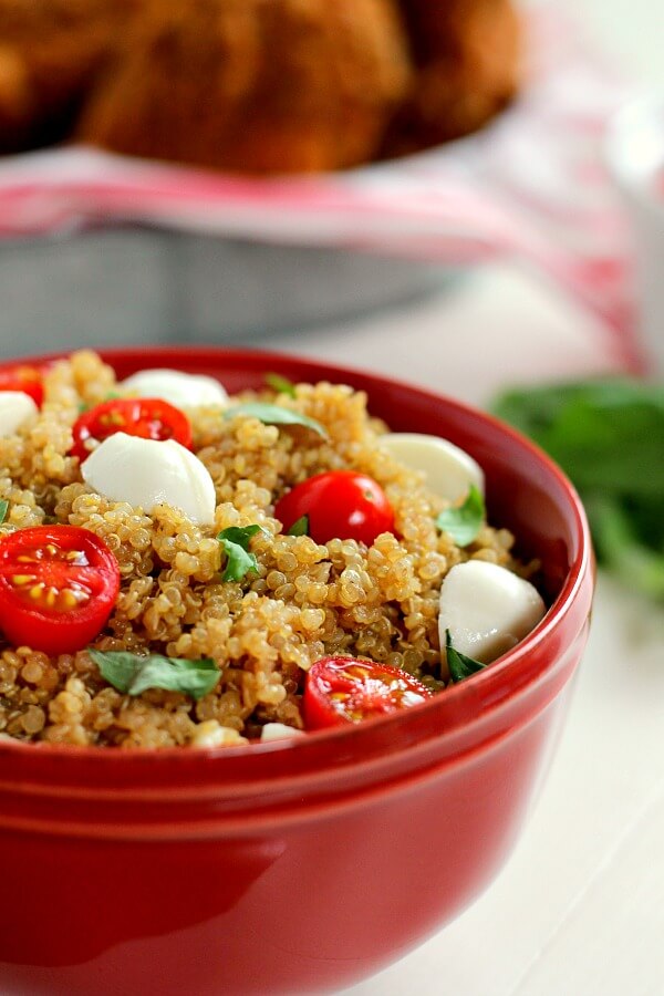 Filled with hearty quinoa, fresh tomatoes, creamy mozzarella, and basil, this Quinoa Caprese Salad combines the classic flavors into a healthier dish. It's easy to make, packed with protein, and is bursting with flavor!