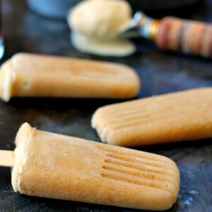 These Root Beer Float Popsicles taste just like the classic drink, but in frozen form! Filled with sweet root beer and creamy vanilla ice cream, these popsicles are the perfect treat to beat the heat!