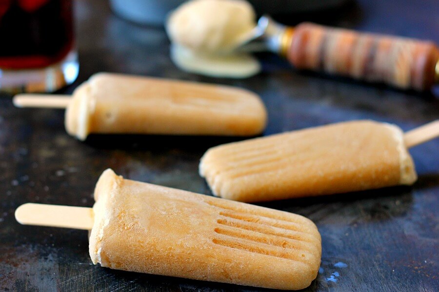 These Root Beer Float Popsicles taste just like the classic drink, but in frozen form! Filled with sweet root beer and creamy vanilla ice cream, these popsicles are the perfect treat to beat the heat!