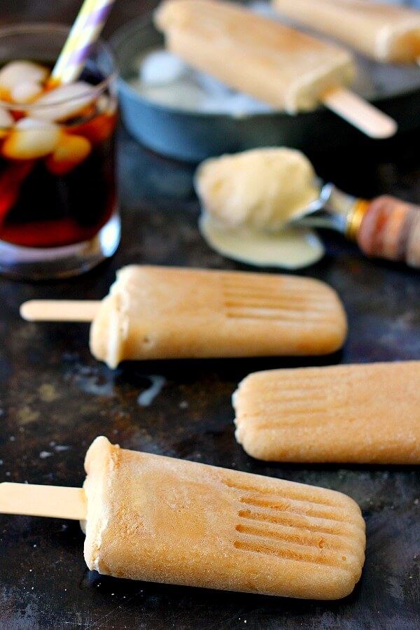 These Root Beer Popsicles taste just like a classic root beer float, but in frozen form. Filled with sweet root beer and creamy vanilla ice cream, these popsicles are the perfect treat to beat the heat!