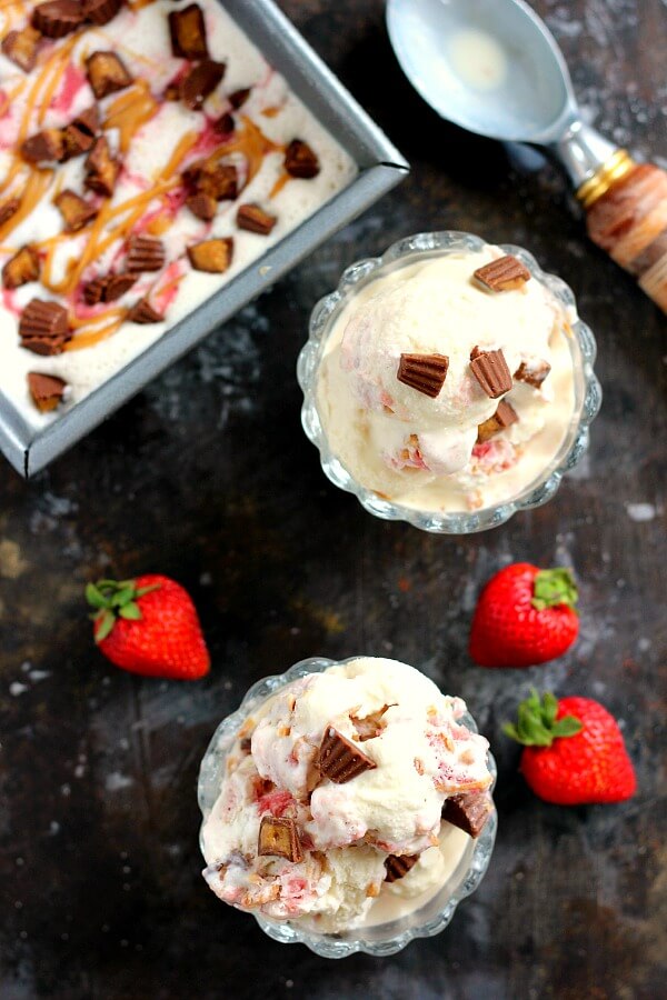 This Strawberry Peanut Butter Swirl Ice Cream is loaded with juicy strawberries and creamy peanut butter, swirled into sweet vanilla cream and then topped with peanut butter cups. And best of all, it's made without an ice cream maker!