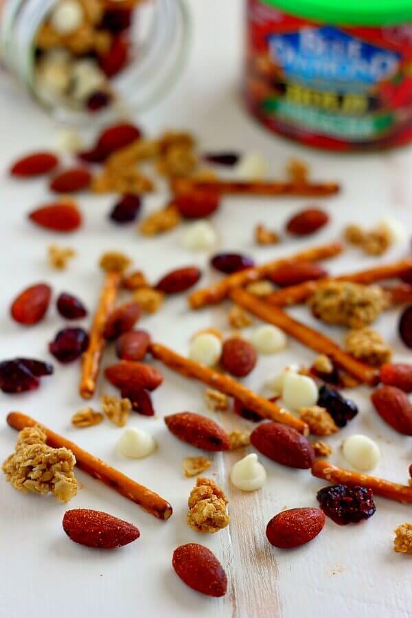 Filled with Sriracha Blue Diamond Almonds, crunchy granola, pretzels, dried cranberries, and white chocolate, this Sweet and Spicy Trail Mix has the perfect combination of sweet and spicy ingredients. 