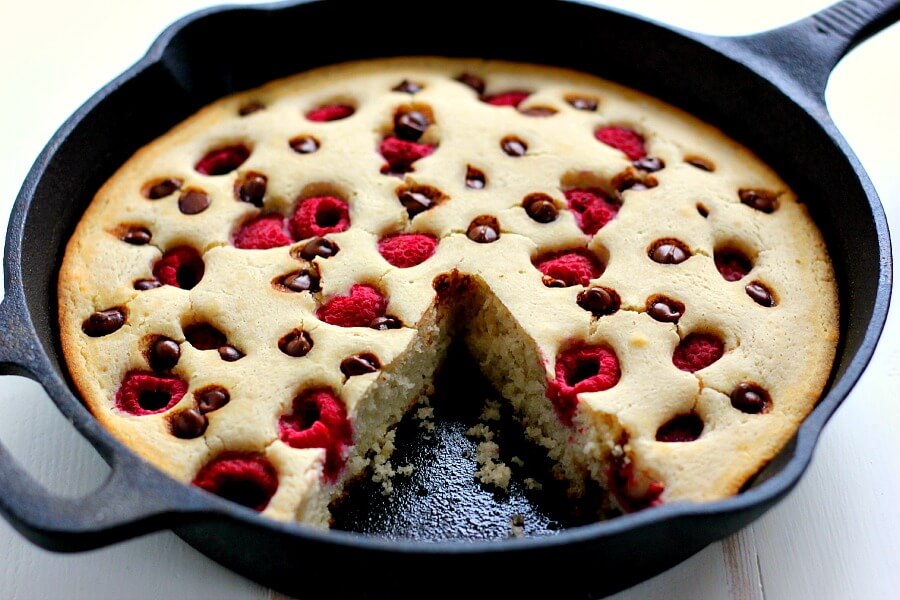 Fluffy, light and bursting with fresh raspberries and chocolate chips, this Baked Raspberry Chocolate Chip Pancake uses Krusteaz's Buttermilk Pancake Mix and is ready in less than thirty minutes. It's sweet enough to eat on its own or sprinkled with some powdered sugar or syrup!