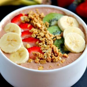 This Chocolate Peanut Butter Smoothie Bowl is jam-packed with nutrients, protein, and fuel to keep you going all day long. It contains just a few simple ingredients and is full of chocolate and creamy peanut butter. You'll never guess that this bowl is secretly healthy!