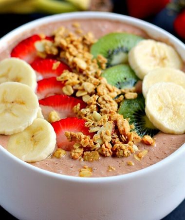 This Chocolate Peanut Butter Smoothie Bowl is jam-packed with nutrients, protein, and fuel to keep you going all day long. It contains just a few simple ingredients and is full of chocolate and creamy peanut butter. You'll never guess that this bowl is secretly healthy!
