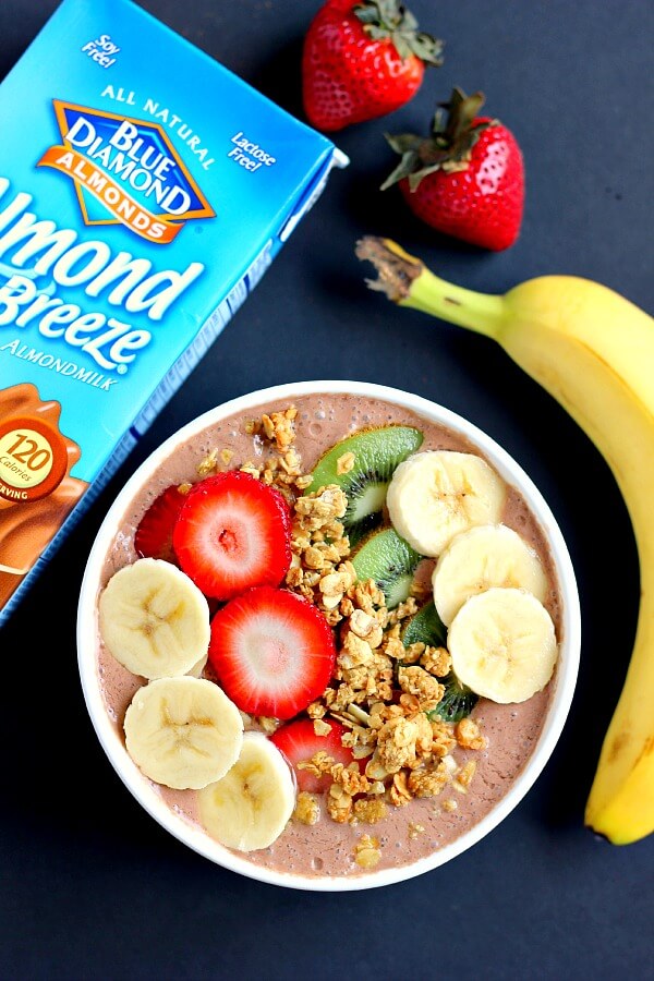 This Chocolate Peanut Butter Smoothie Bowl is jam-packed with nutrients, protein, and fuel to keep you going all day long. It contains just a few simple ingredients and is full of chocolate and creamy peanut butter. You'll never guess that this bowl is secretly healthy!