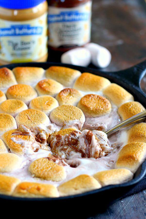 Loaded with creamy peanut butter, luscious dark chocolate peanut butter, and topped with toasted vanilla and chocolate marshmallows, this Chocolate Peanut Butter S'mores Dip is the perfect summer treat! 