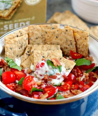 Loaded with the classic toppings of bacon, lettuce, and tomato, this Skinny BLT Ranch Dip is made with a Greek yogurt base and swirled with hints of ranch dressing.
