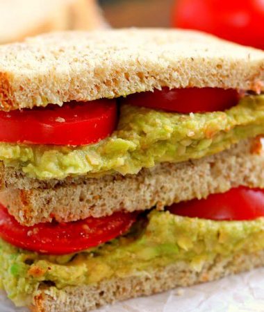 This Smashed Chickpea and Avocado Sandwich is loaded with flavor and makes a light and healthy lunch or dinner. Chickpeas and avocados make the perfect pair when blended with a touch of spice and lime juice!
