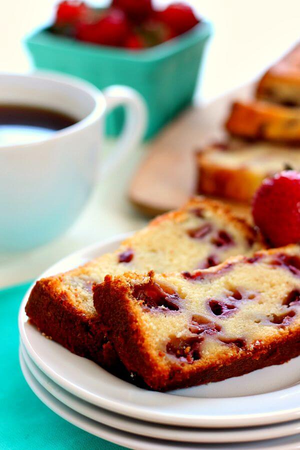 Filled with fresh strawberries, cream cheese, and a touch of vanilla, this pound cake is moist, flavorful, and bursting with strawberries. This cake contains just a few ingredients and is a breeze to whip up.