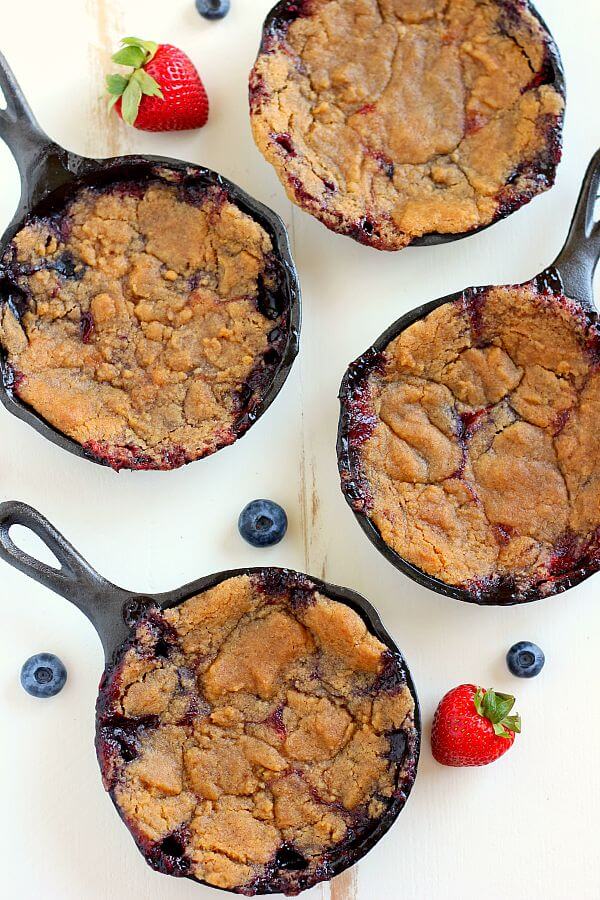 This Berry Skillet Cobbler contains fresh strawberries and juicy blueberries that are combined with a hint of sweetness and baked with a brown sugar topping. It's easy to prepare and is bursting with fresh flavors!