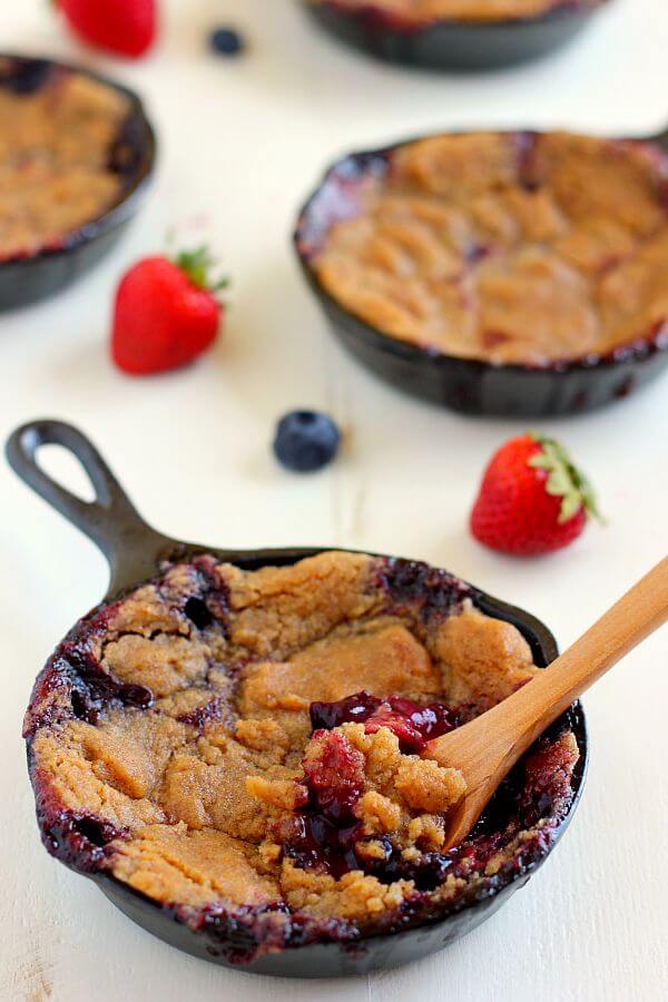 This Berry Skillet Cobbler contains fresh strawberries and juicy blueberries that are combined with a hint of sweetness and baked with a brown sugar topping. It's easy to prepare and is bursting with fresh flavors!