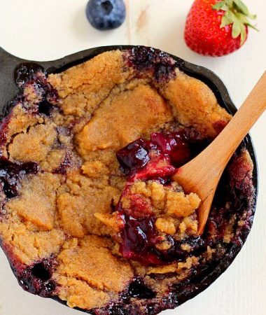 This Berry Skillet Cobbler contains fresh strawberries and juicy blueberries that are combined with a hint of sweetness and baked with a brown sugar topping. It's easy to prepare and is bursting with fresh flavors!