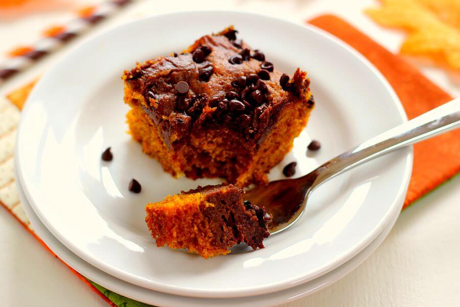 These Chocolate-Swirled Pumpkin Bars are soft, moist, and bursting with flavor. The pumpkin cake is filled with hints of cinnamon and spices and swirled with a chocolate cream cheese mixture!